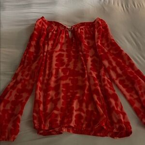 Jennifer Lopez Vibrant Orange Blouse